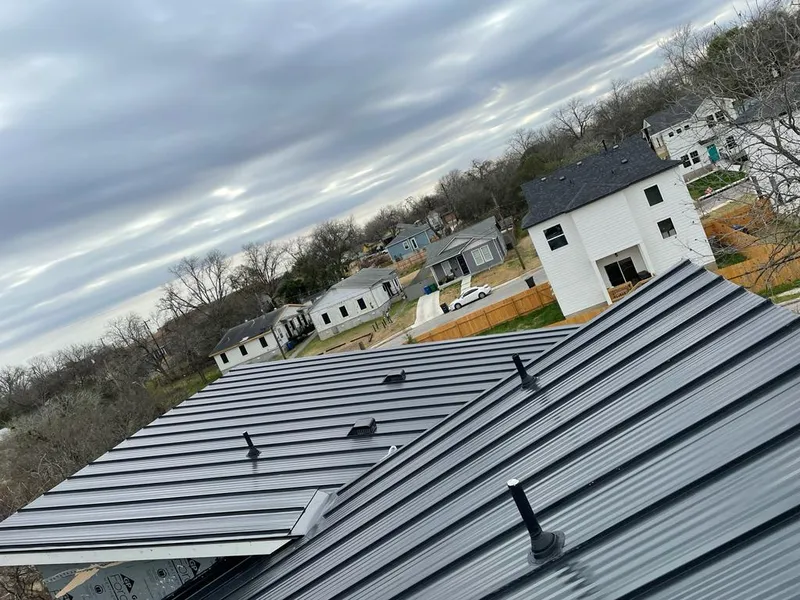 Standing seam metal roof panels with vents for Skylight Repair in Corpus Christi